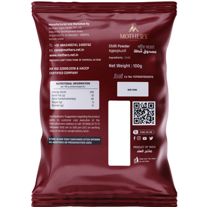 Back of Mother’s Red Chilli Powder pack displaying ingredients as pure chilli along with certified manufacturing standards and FSSAI license details.